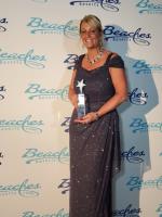 Kim Caudill Sandals award event