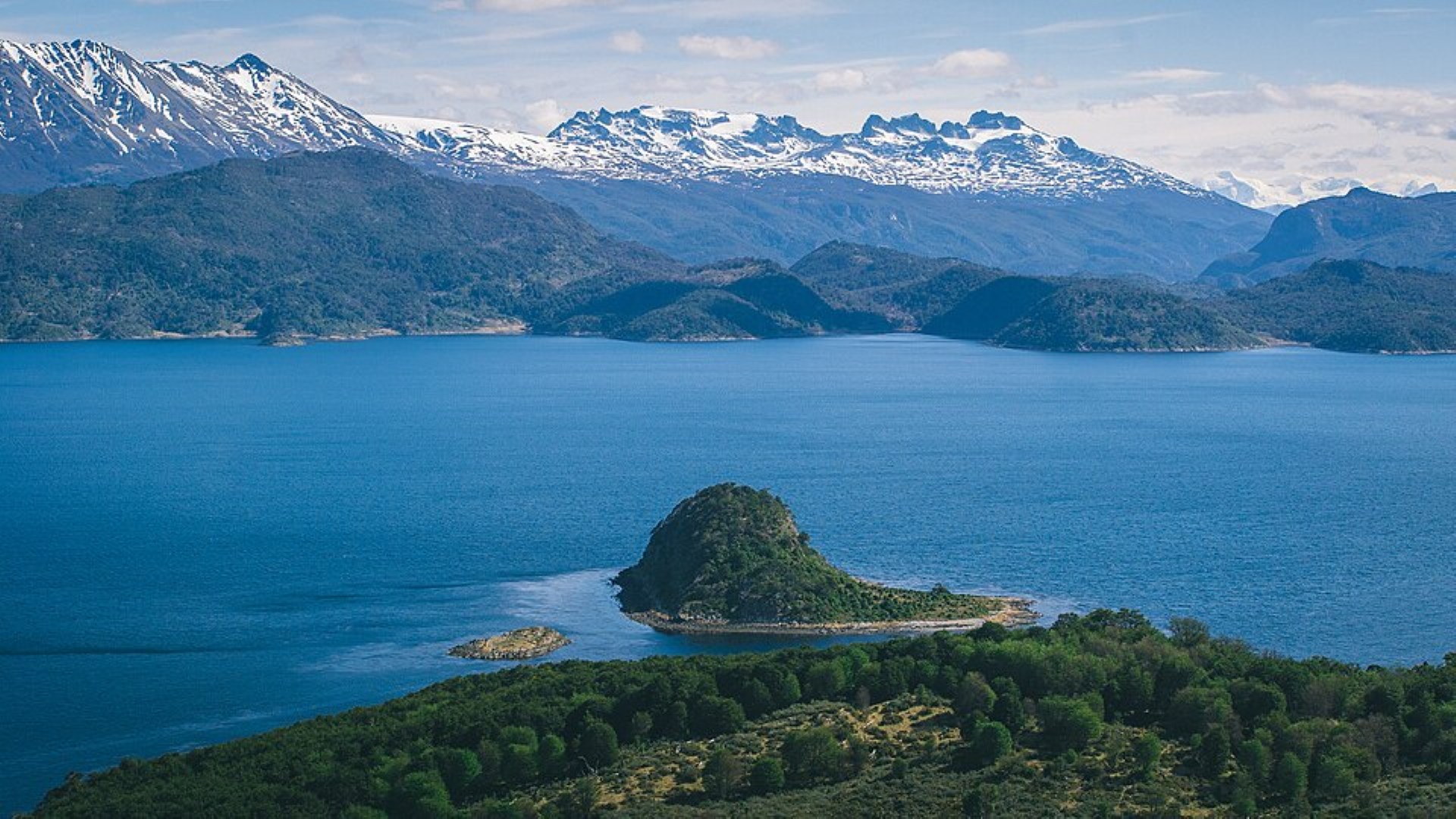 A panoramic view of the Beagle Channel from the Wulaia viewpoint on Navarino Island, Chile. - Photo Credit: Photo: Felipe Gera / Marca Chile, CC BY-SA 2.0, via Wikimedia Commons