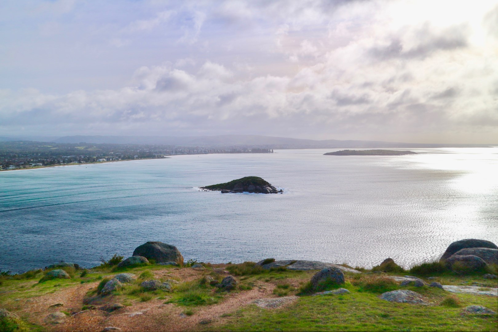 A panoramic view across Encounter Bay toward Victor Harbor from Rosetta Head. - Photo Credit: Leybj003