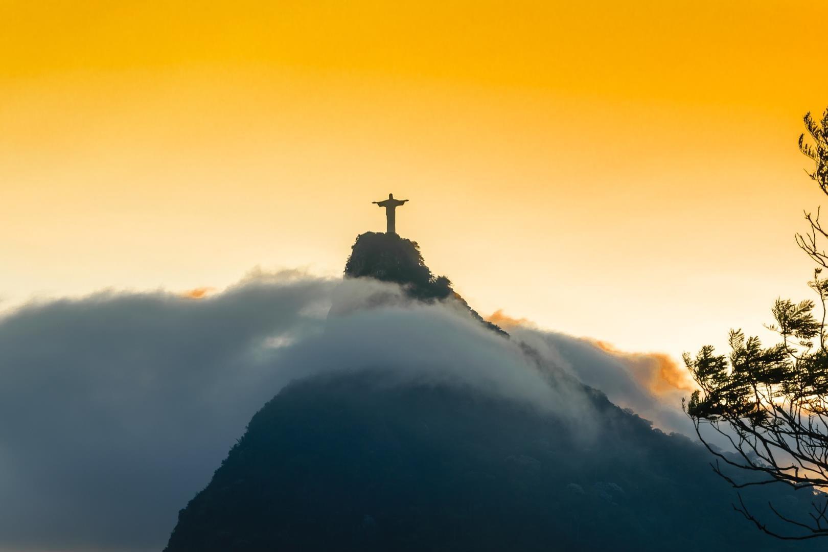 Christ the Redeemer at sunrise Christ the Redeemer at sunrise - Photo Credit: Heiko Behn