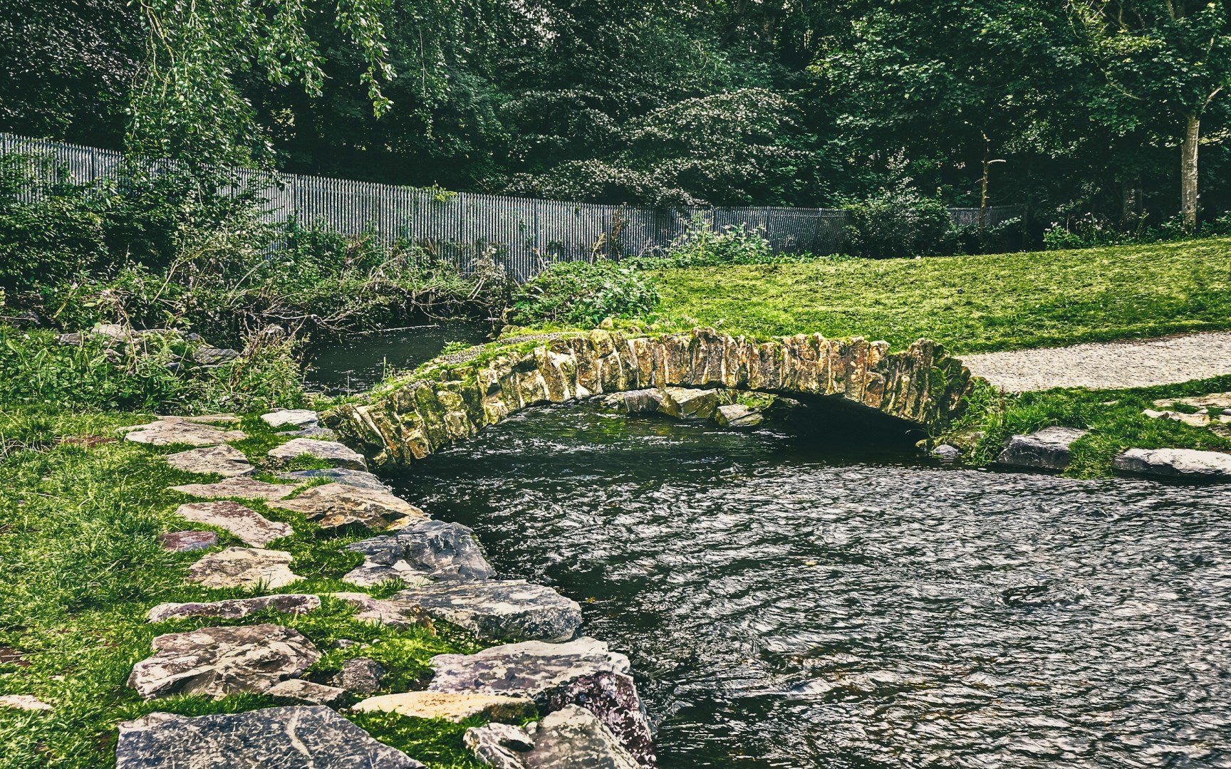 Conn O'Neill stone bridge at Connswater Greenway - Photo Credit: Photo by K. Mitch Hodge on Unsplash