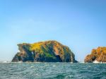 Drinking dragon and the chicken rock lighthouse - Photo Credit: Photo by James Qualtrough 🇮🇲 on Unsplash
