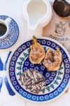 Portuguese breakfast with salame chocolate, figs and coffee - Photo Credit: Photo by Katie Luka on Unsplash