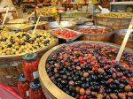 Olives at an outdoor market - Photo Credit: Photo by Hasmik Ghazaryan Olson on Unsplash
