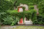 house embedded in a old town wall in Tallinn, Estonia - Photo Credit: Photo by Julius Jansson on Unsplash