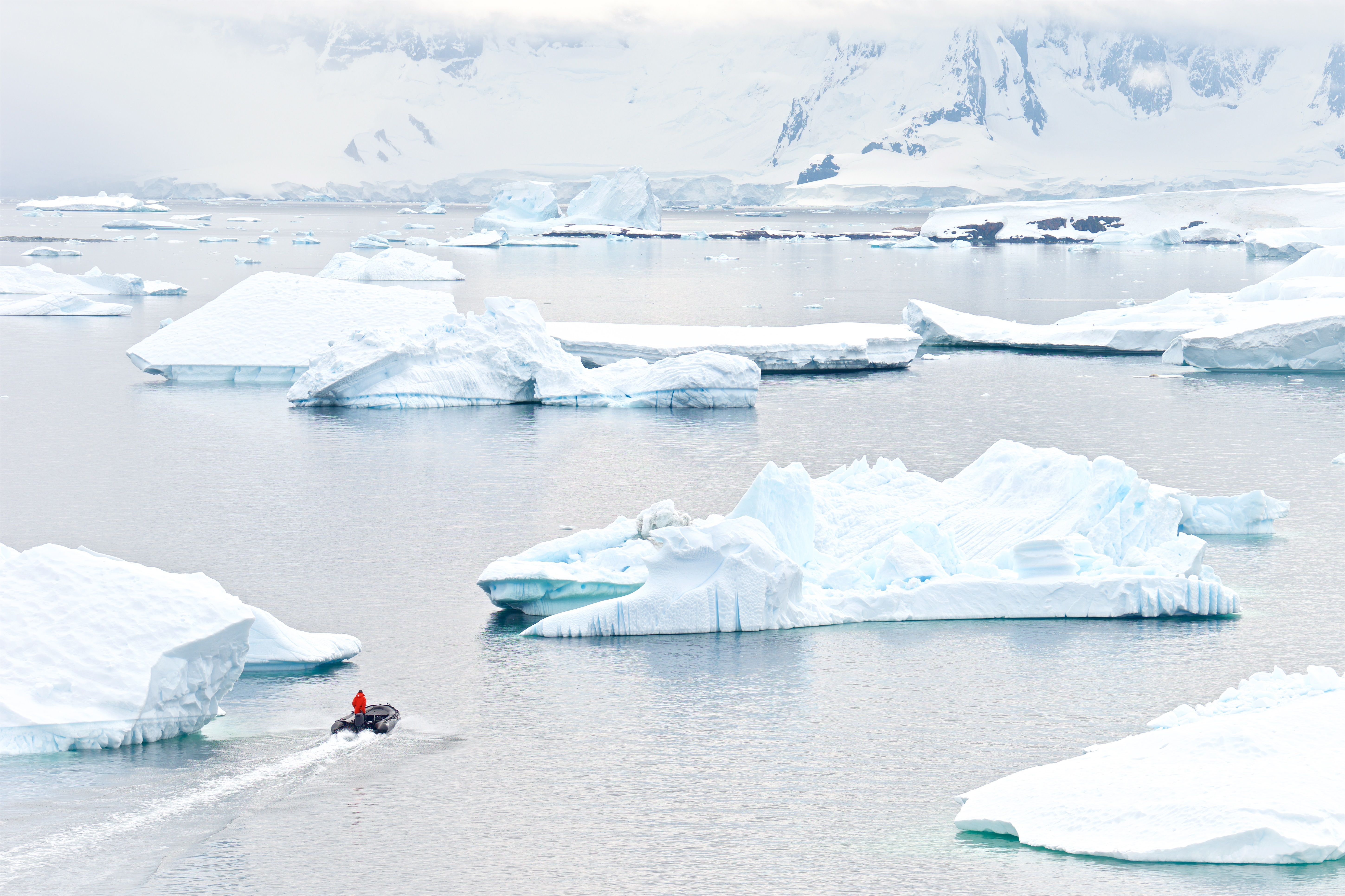 Glacier with zodiac, Antarctica