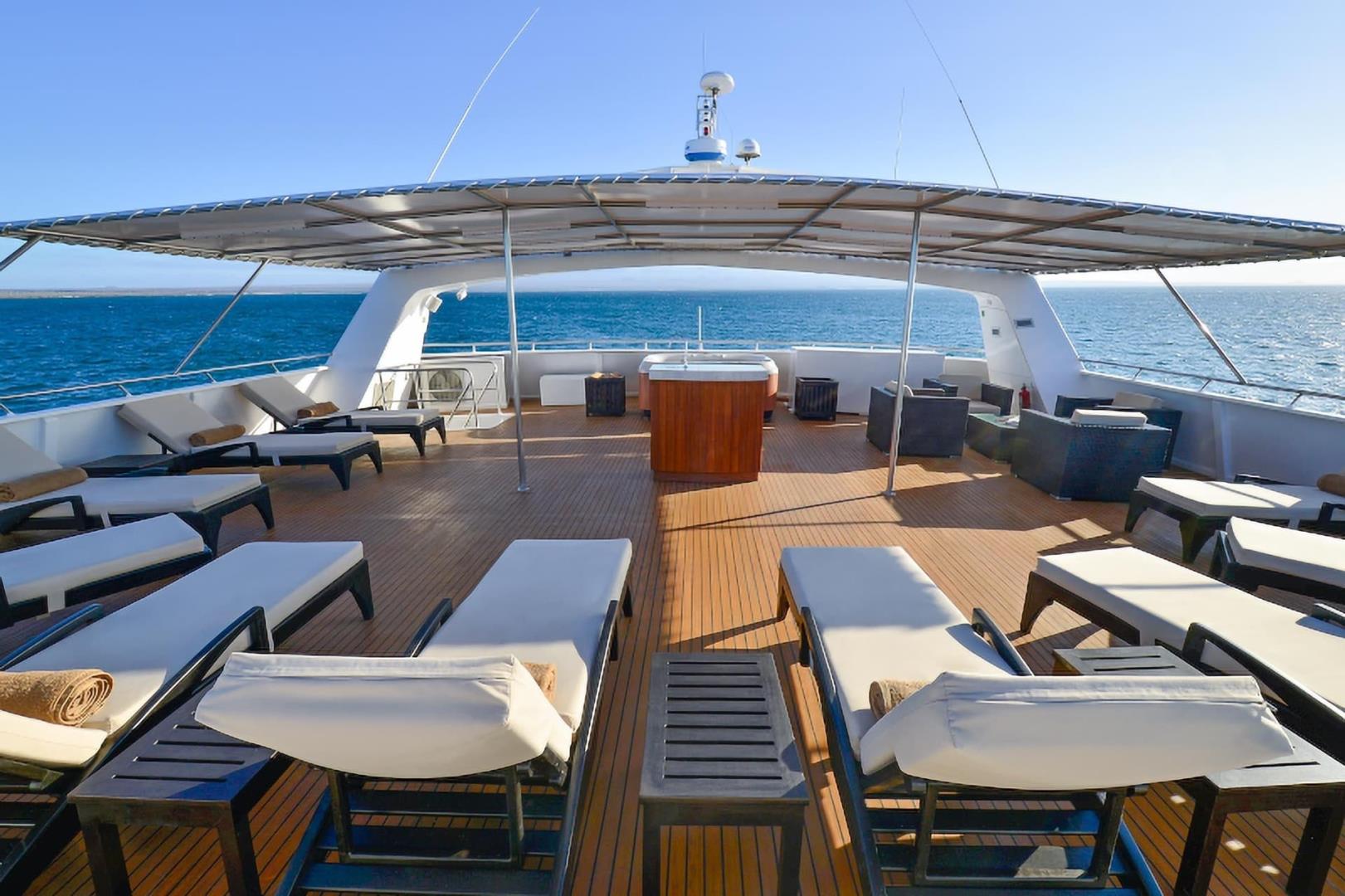 Shaded sun-deck loungers