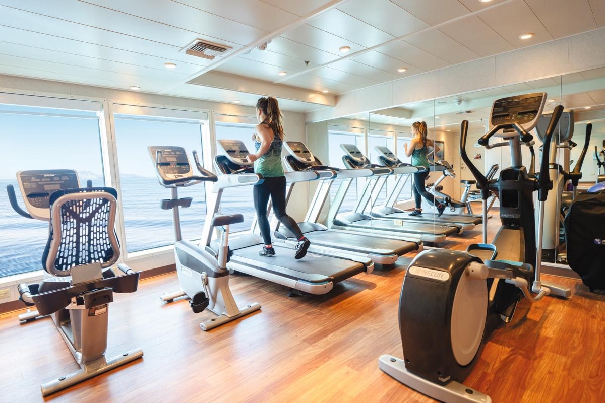 Fitness room with sea views