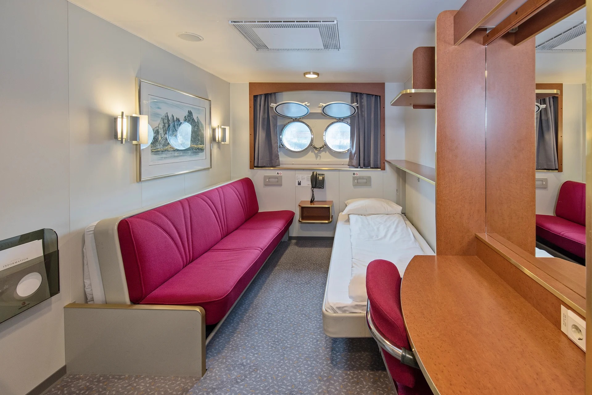 Twin bed on lower deck with porthole