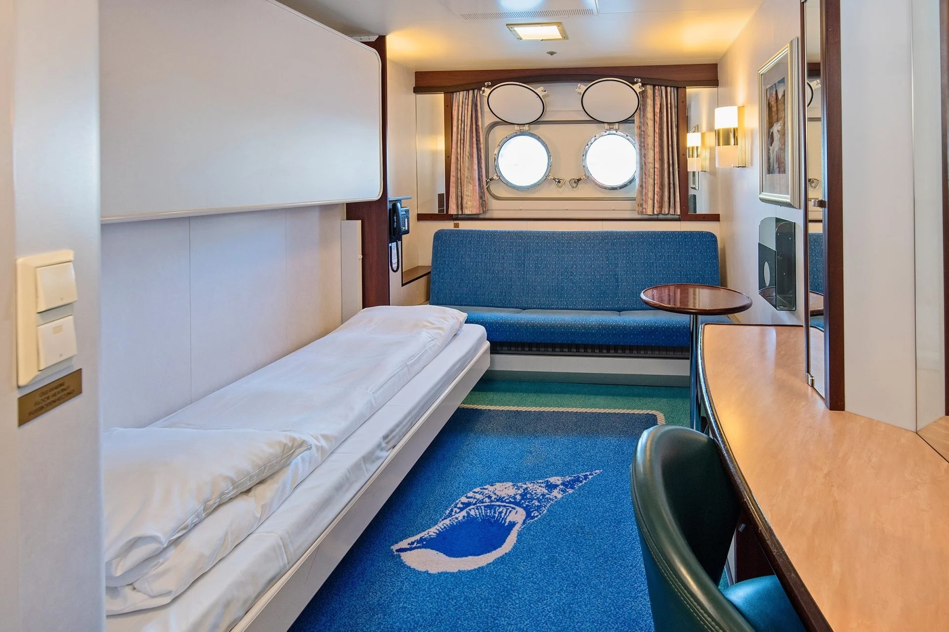 Triple on lower deck with porthole
